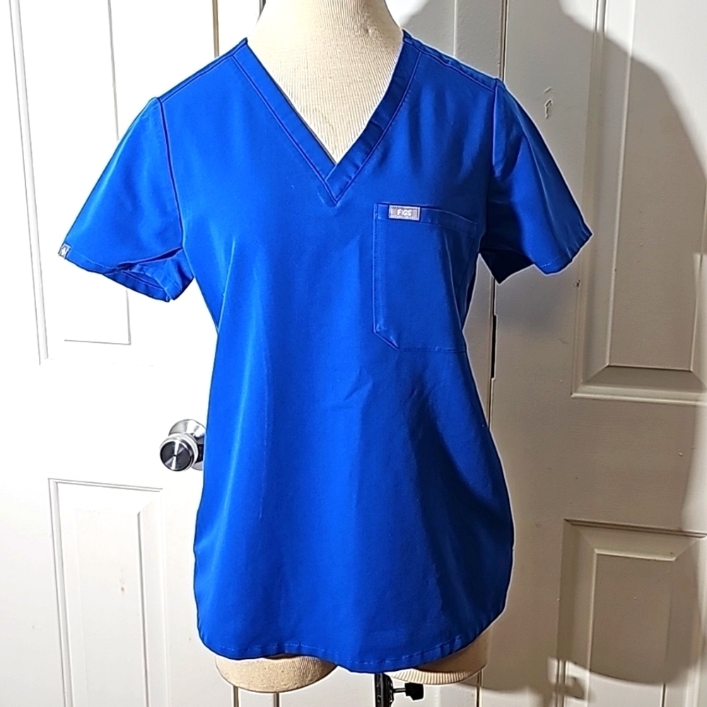 FIG, scrub top blue size‎ small. V neck. One pocket.